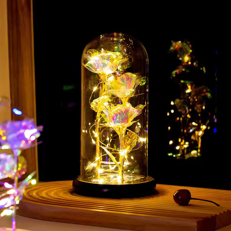 Fleur de rose arc-en-ciel lumineuse